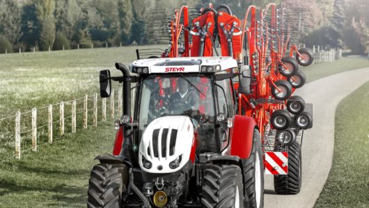 Steyr 6145 windrower kuhn transport 032018 2362 3543